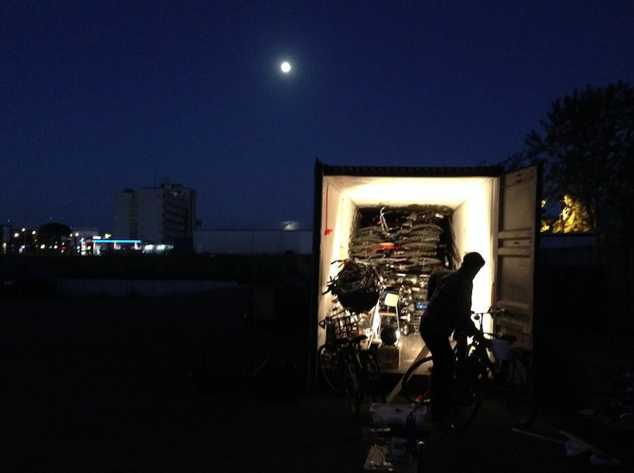 LoadingAtNightPlainBikes